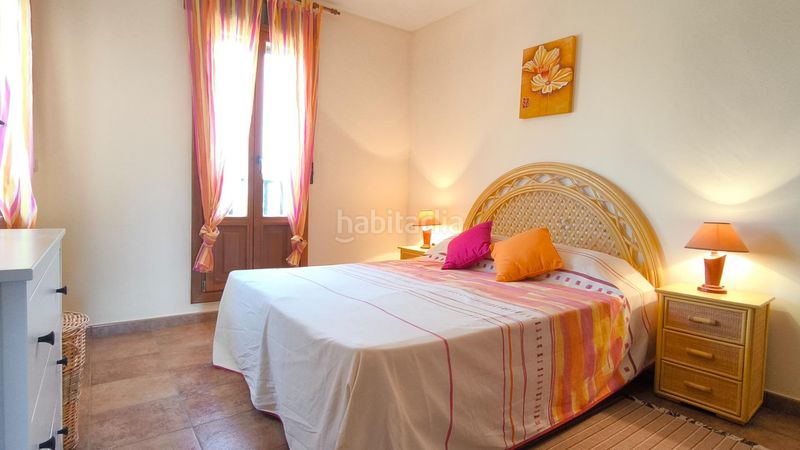Foto a56b7c5c-be5e-4129-878c-b6204dd6f26c. Casa a schiera con parcheggio piscina in Costa Esuri Ayamonte