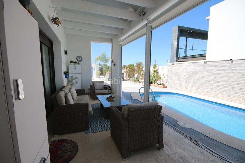 Foto b0377f63-fce2-4ff3-be9e-9a466569a180. Xalet amb aparcament piscina a Costa Esuri Ayamonte