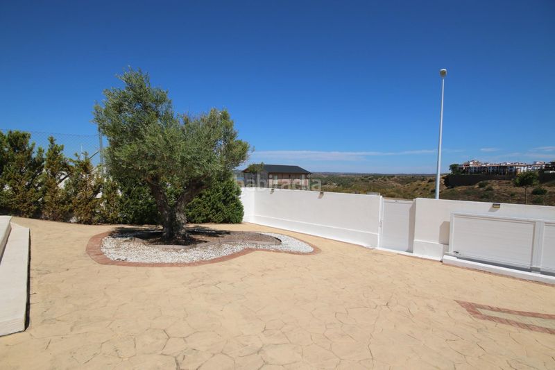Foto cef772f6-e73c-4037-939f-4e8880f9a1f6. Xalet amb aparcament piscina a Costa Esuri Ayamonte