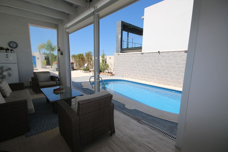 Foto f505a400-03bb-4009-b529-3a3cc2a9839b. Xalet amb aparcament piscina a Costa Esuri Ayamonte