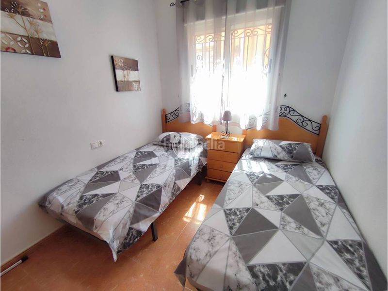 Foto dea3ea75-4a83-4aa2-8e16-f537e6872cb0. Casa aparellada amb piscina a La Florida Orihuela