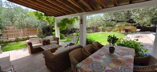 Casa a L´Ametlla de Mar. Encantadora villa independiente con jardín mediterráneo y piscin