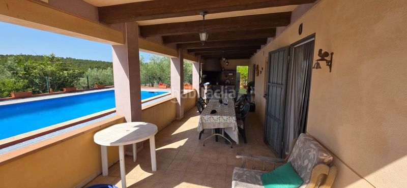 Foto b8b91cec-70c6-43a3-a49a-4635d7286057. Masia amb aparcament piscina a Perelló (El)