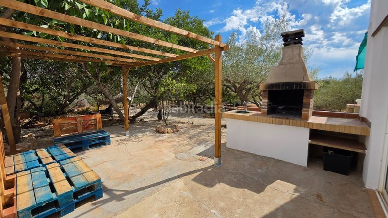 Foto ba876666-ad07-4da7-96b8-8c76f2456ca7. Masía magnífica finca rústica de 14.000 m2 con casa legalizada, luz de red y pozo propio a 5 km del mar en Perelló (El)