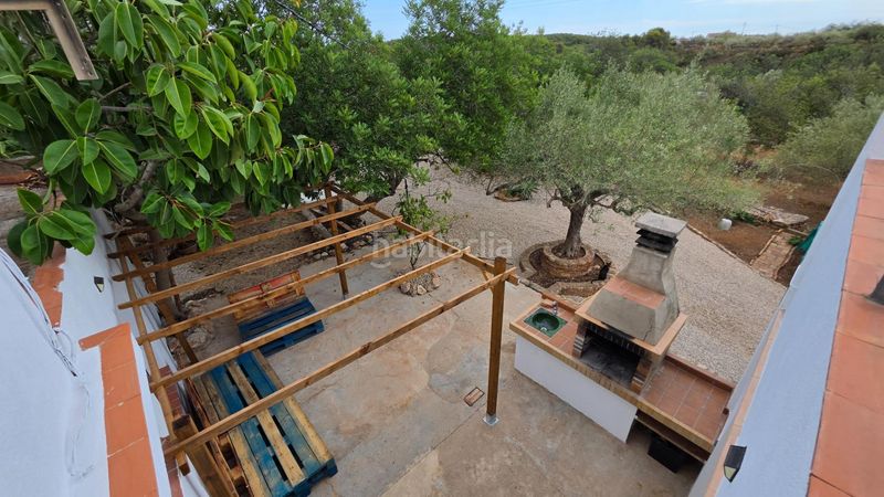 Foto baef6df6-7569-425c-b05a-e552dce833a3. Masía magnífica finca rústica de 14.000 m2 con casa legalizada, luz de red y pozo propio a 5 km del mar en Perelló (El)