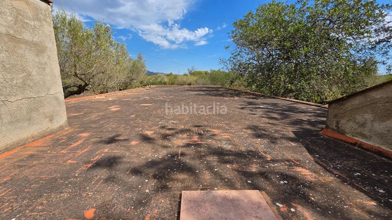 Foto d6d8414f-1c7d-49b0-9a7f-d43a079e3573. Masía magnífica finca rústica de 14.000 m2 con casa legalizada, luz de red y pozo propio a 5 km del mar en Perelló (El)