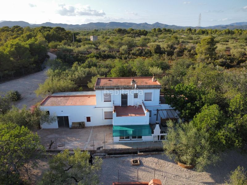 Foto ee88645d-5106-4c2b-a1b9-dbd980b0332c. Masía magnífica finca rústica de 14.000 m2 con casa legalizada, luz de red y pozo propio a 5 km del mar en Perelló (El)