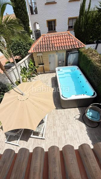 Foto 5f97e4ab-a336-46b2-8815-cd42a168da8e. Casa adosada exclusivo adosado de esquina completamente reformado con piscina privada pueblo en Benalmádena