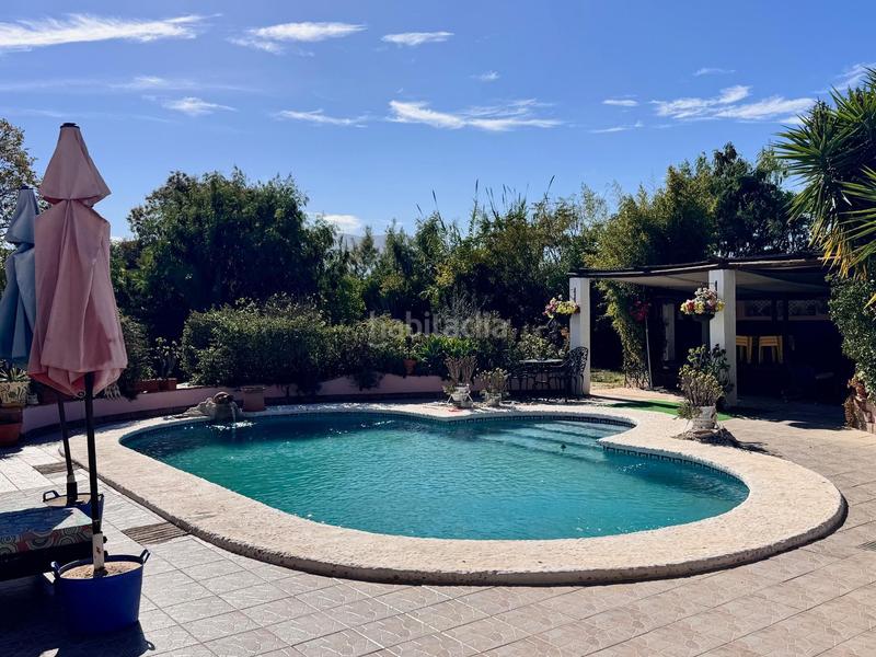 Foto bc5c5d94-a7a3-400a-b883-cc3c7cf39d58. Casa con piscina in Cártama