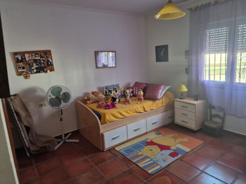 Foto 437e5f5b-840b-4b5c-9443-117a02abd8a8. Casa amb piscina a Palomares del Río