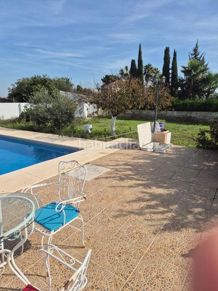 Foto edd09a7e-daab-46f5-8b7f-b2127452375a. Casa amb piscina a Palomares del Río