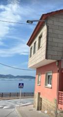 Casa a Poio. Causa en la playa de raxo