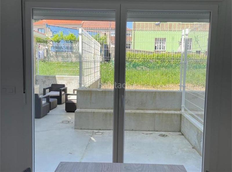 Foto 7f43349e-8042-4371-b1f3-6859d21378a9. Casa adossada a lugar san cibran 110 a Aldán Cangas