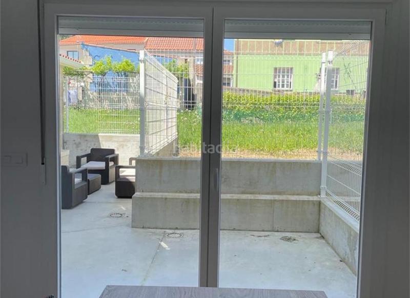 Foto cd7460ba-8c11-411d-9581-10666e041dc6. Casa adossada a lugar san cibran 110 a Aldán Cangas