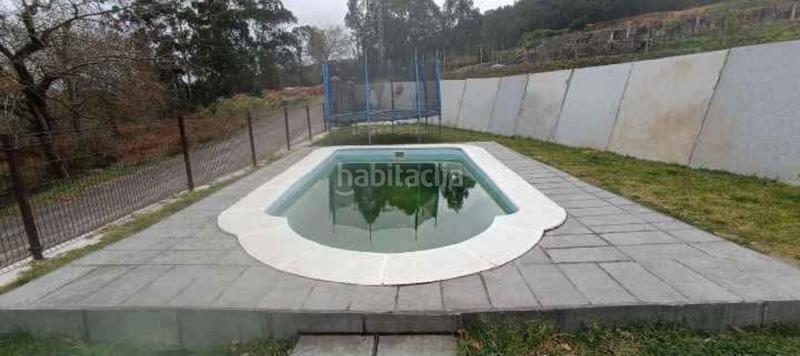 Foto bd461eee-1fe3-4334-91cd-96a768ae2af6. Casa  con piscina. en Tui