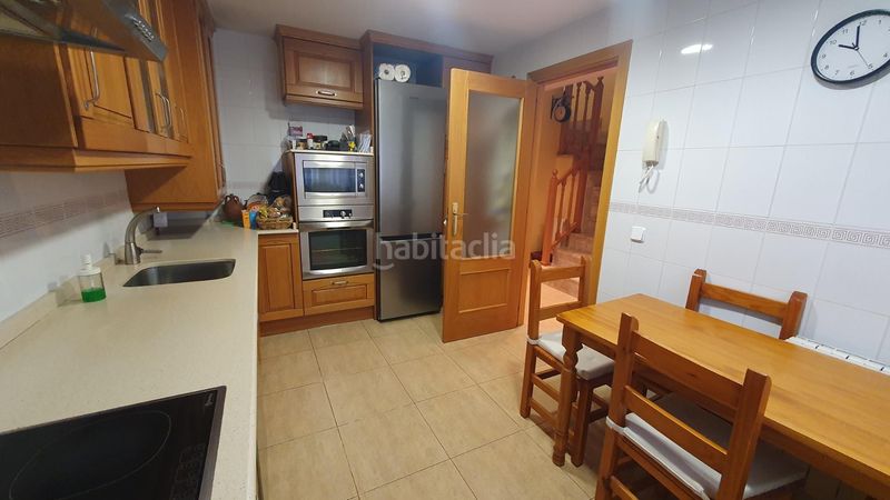 Foto 50e52f2e-83b7-455d-9b67-de87982175f0. Casa adossada amb calefacció aparcament piscina a Alcalá de Henares