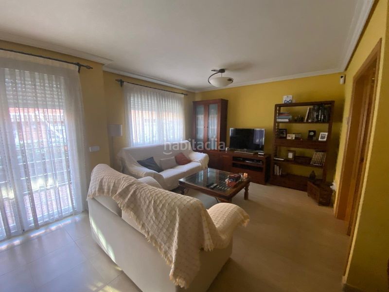 Foto aaa9779b-c7cc-4bab-a448-ea7355d9c000. Casa adossada amb calefacció aparcament piscina a Alcalá de Henares