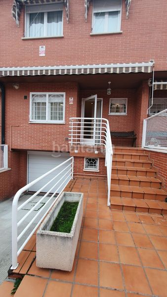 Foto bd0b9e2b-cad0-4074-b94a-9846b9a89b07. Casa adossada amb calefacció aparcament piscina a Alcalá de Henares