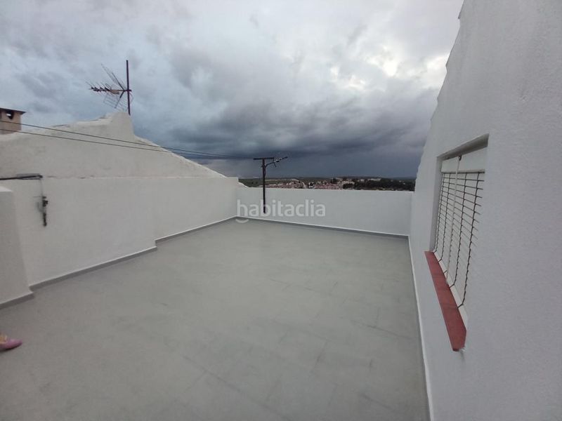 Foto b9feb6fb-9534-4055-9238-84a07bfb90d6. Casa adossada amb calefacció aparcament a Martos