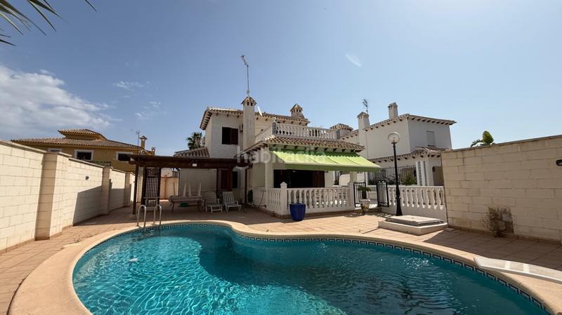 Foto 7f229805-63db-488a-9d10-e3388a195616. House with parking pool in La Zenia Orihuela