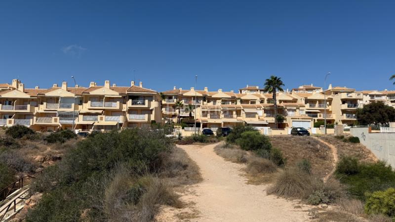Foto bbc81497-30ed-4148-b4ad-d62a74f43d4f. Duplex with parking pool in Aguamarina Orihuela