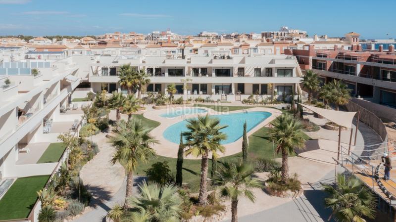Foto a15642cd-8545-44fb-a61c-f9d96d2ddcc2. Maison jumelée avec parking piscine dans Playa de los Náufragos Torrevieja