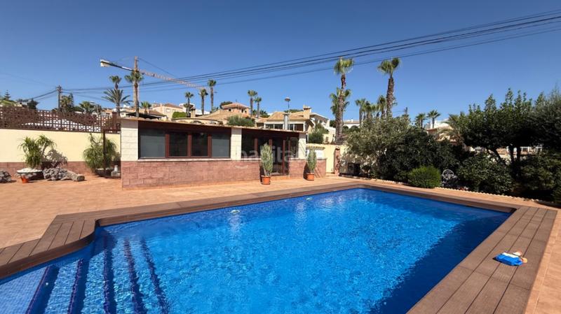 Foto 7c7ad012-9ad4-4f68-a40f-e293f6c84ab3. House with parking pool in Los Balcones-Los Altos Torrevieja