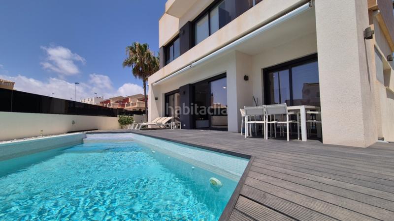 Foto 8c49c1c1-784b-4c39-abdb-c5b43f8c76a8. House with parking pool in Aguas Nuevas Torrevieja