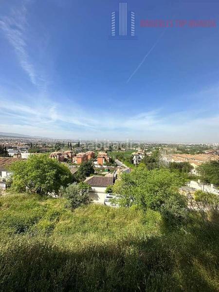 Foto f31c344f-988f-4ea3-9d1b-a529da830808. Terrain résidentiel dans Huétor Vega