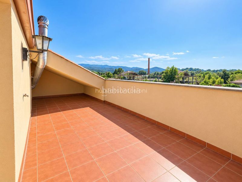 Foto b77735c8-cc73-46b9-838d-437dfd6e80ca. Duplex avec piscine dans Riells i Viabrea