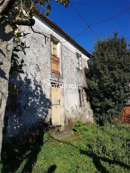 Foto e1d56f0f-f5cb-42de-bace-1e79212a4350. Casa total home vende casa de piedra para restaurar en Teo