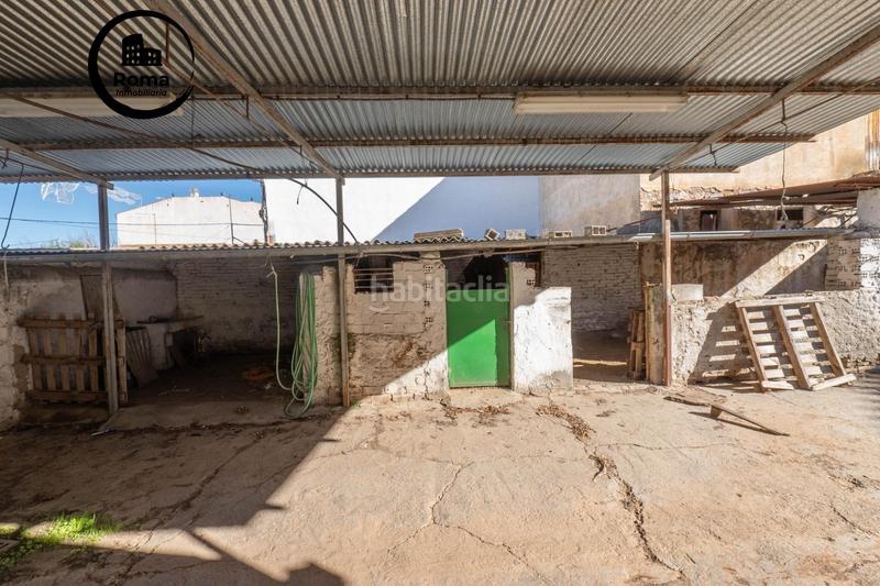 Foto 1eb6016a-9e7f-472f-8470-4a16836b1a6e. Masía en calle de la gardenia 4 vivienda con múltiples opciones en Albolote