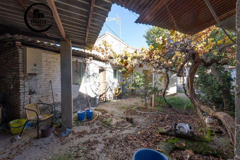 Foto ab48d644-89f3-4861-8395-03a5ecf2be9f. Masía en calle de la gardenia 4 vivienda con múltiples opciones en Albolote