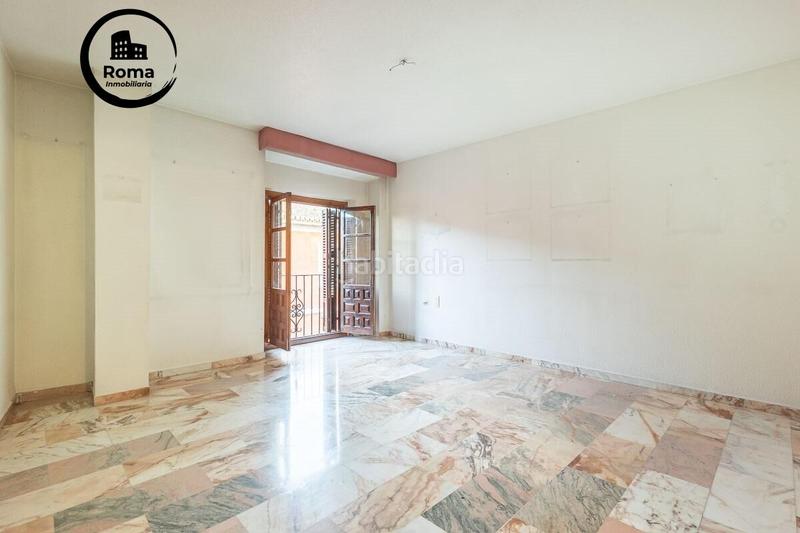 Foto 5d78a9a7-5e0e-403b-8422-82e06c0a1011. Piso descubre tu nuevo hogar en el encantador barrio del realejo, en el corazón ! en Granada
