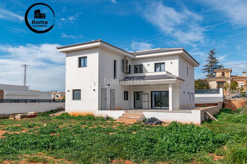 Foto 4b265dd1-65f2-496c-9dcf-12f74643e53a. Chalet  nueva construcción . 5 dormitorios ,3 baños. en Otura