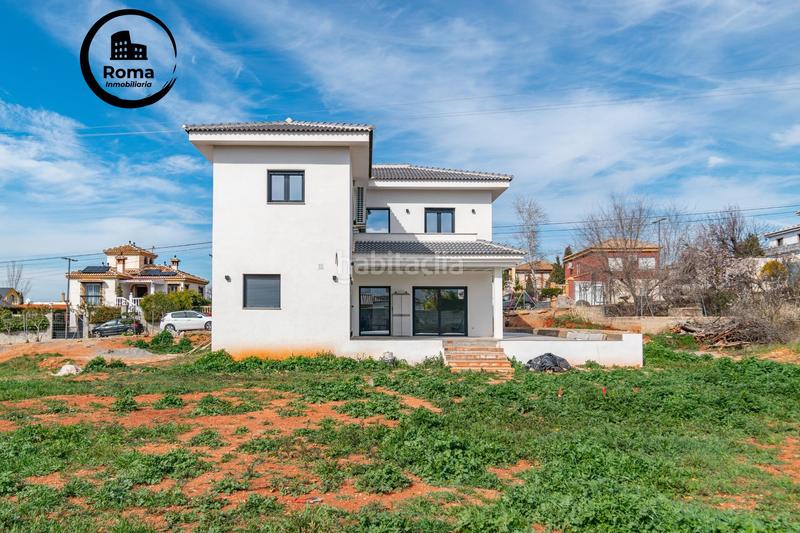 Foto ef597f04-d2d3-4fd0-b944-569788bc26aa. Chalet  nueva construcción . 5 dormitorios ,3 baños. en Otura