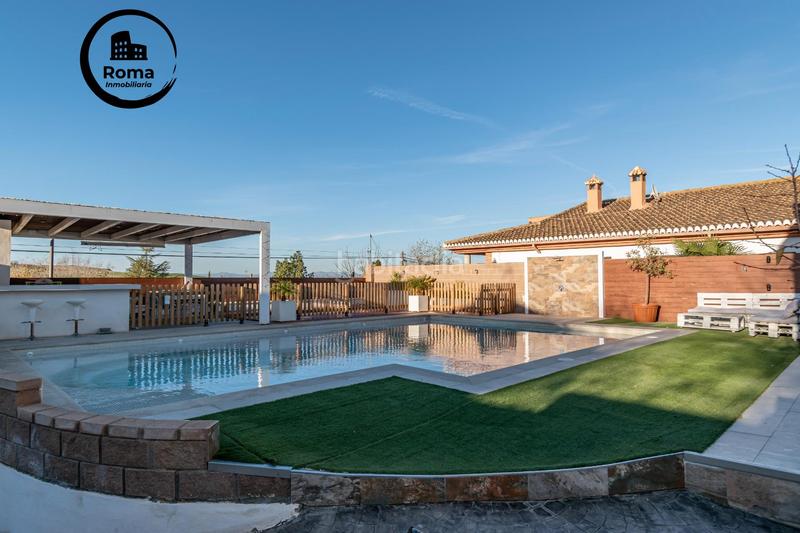 Foto 55d1c08b-3e1f-4531-b70b-d7bea198b84c. Chalet preciosa casa totalmente reformada en suspiro del moro, en Otura