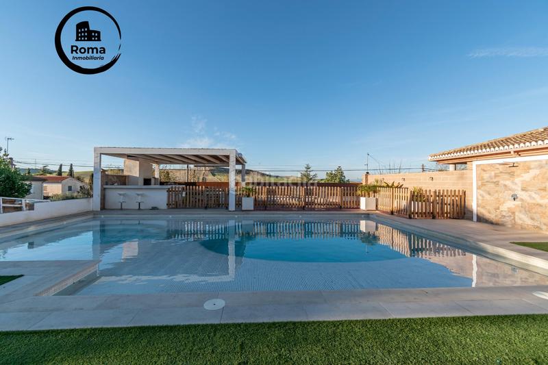 Foto b68920e1-f848-4234-90e1-dc1cc8e88e3f. Chalet preciosa casa totalmente reformada en suspiro del moro, en Otura