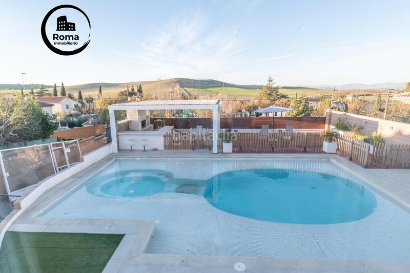 Foto e61c1ce6-cf7e-4bea-a77b-f03a37371308. Chalet preciosa casa totalmente reformada en suspiro del moro, en Otura