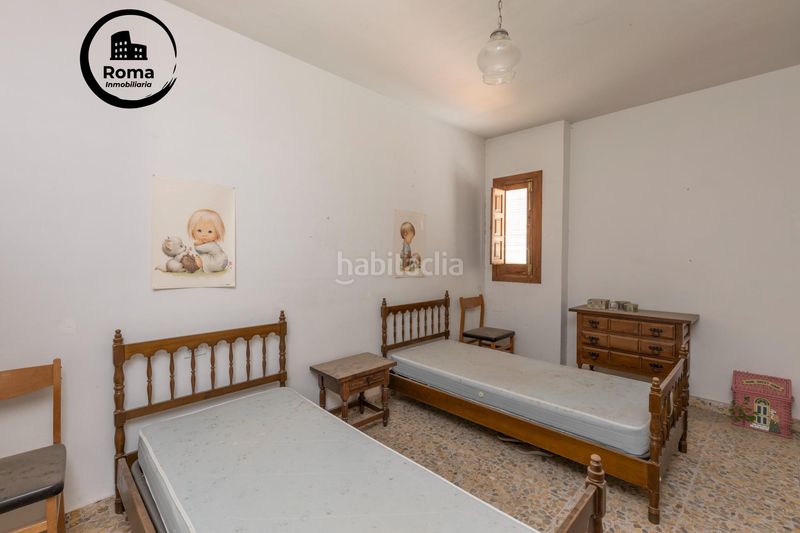 Foto b389225f-fb4e-44b2-b10b-0949fc3eb4a8. Casa con parcheggio piscina in Cájar