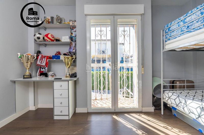 Foto ab1ce6a2-e43f-49c2-bca4-77c95ecdd8f8. Casa aparellada amb calefacció aparcament piscina a Zubia (La)