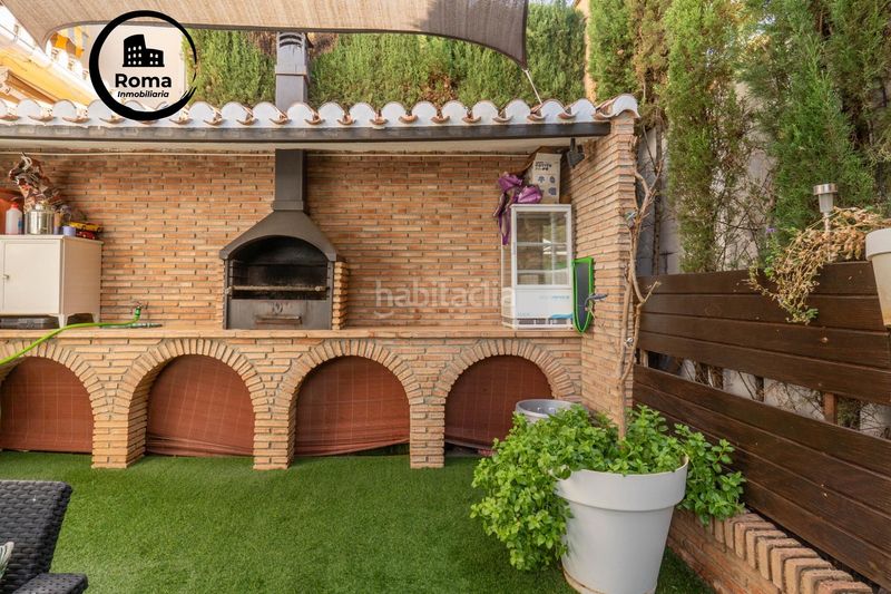 Foto ca6cc8f6-581f-43d3-86f0-a3ab31ce661e. Casa aparellada amb calefacció aparcament piscina a Zubia (La)