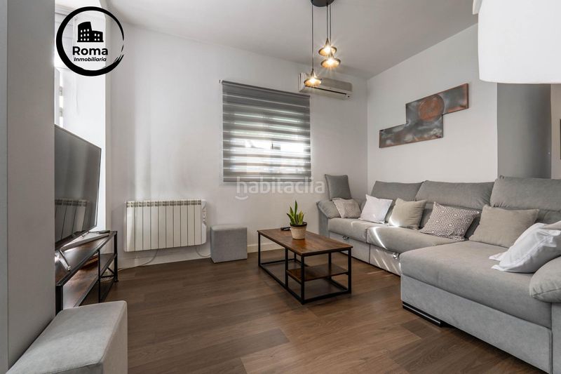 Foto d627f1c7-5d81-4162-b239-f4335a263c29. Casa aparellada amb calefacció aparcament piscina a Zubia (La)