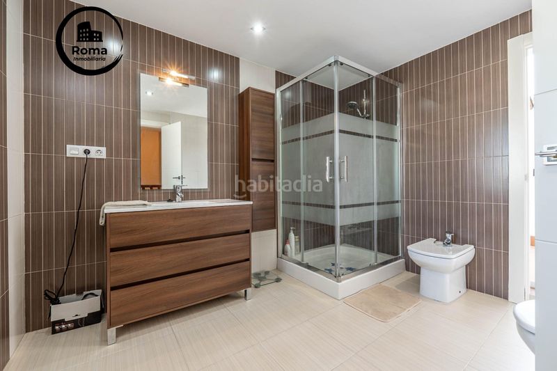 Foto f9954a86-8f42-404a-ad47-6daf51c54263. Casa aparellada amb calefacció aparcament piscina a Zubia (La)