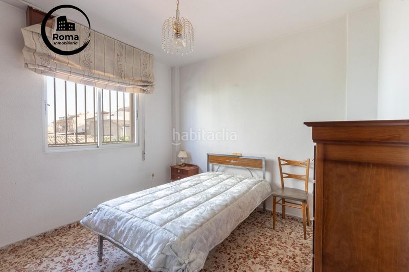 Foto 00fe1ece-3d00-4dea-a6cc-f6c3650f7c16. Casa adossada amb calefacció aparcament a Maracena