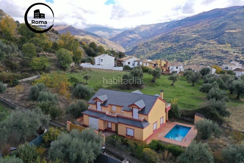 Foto f5f78b18-80c0-4d9a-8f93-c240728c55e7. Xalet amb aparcament piscina a Güéjar Sierra