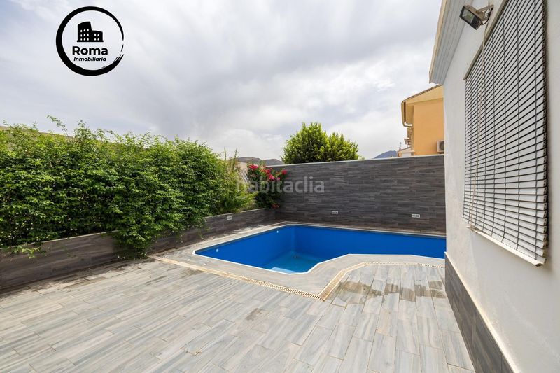 Foto cd96d07f-7145-4877-80fd-3c25c8de8937. Casa amb xemeneia calefacció aparcament piscina a Monachil