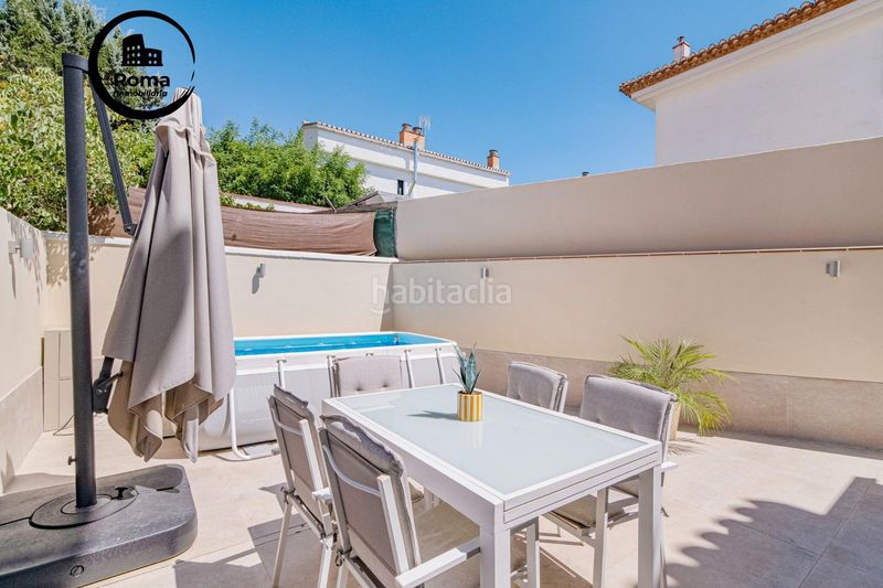 Foto 278c1a02-a48f-4e53-ba63-abbf92ee37ae. Casa aparellada amb calefacció a Ogíjares