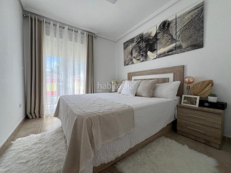 Foto 465e228f-69c8-41da-bb56-7e32d4ec6db1. Casa adossada amb piscina a Pueblo Acantilado-Lanuza Campello (el)