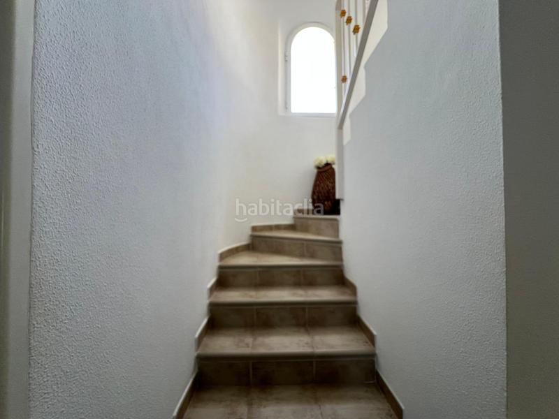 Foto bc5a34c8-dfb3-45a2-a786-4f7ae80c14e7. Casa adossada amb piscina a Pueblo Acantilado-Lanuza Campello (el)